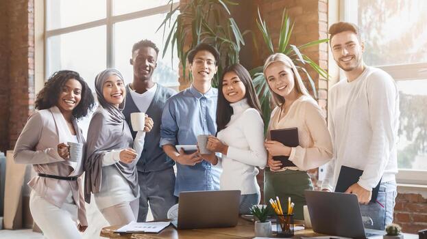 Diverse group of professionals collaborating in a bright office
